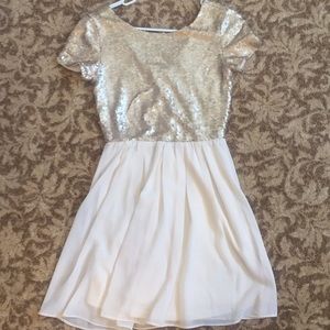 Gold, fit and flare dress.